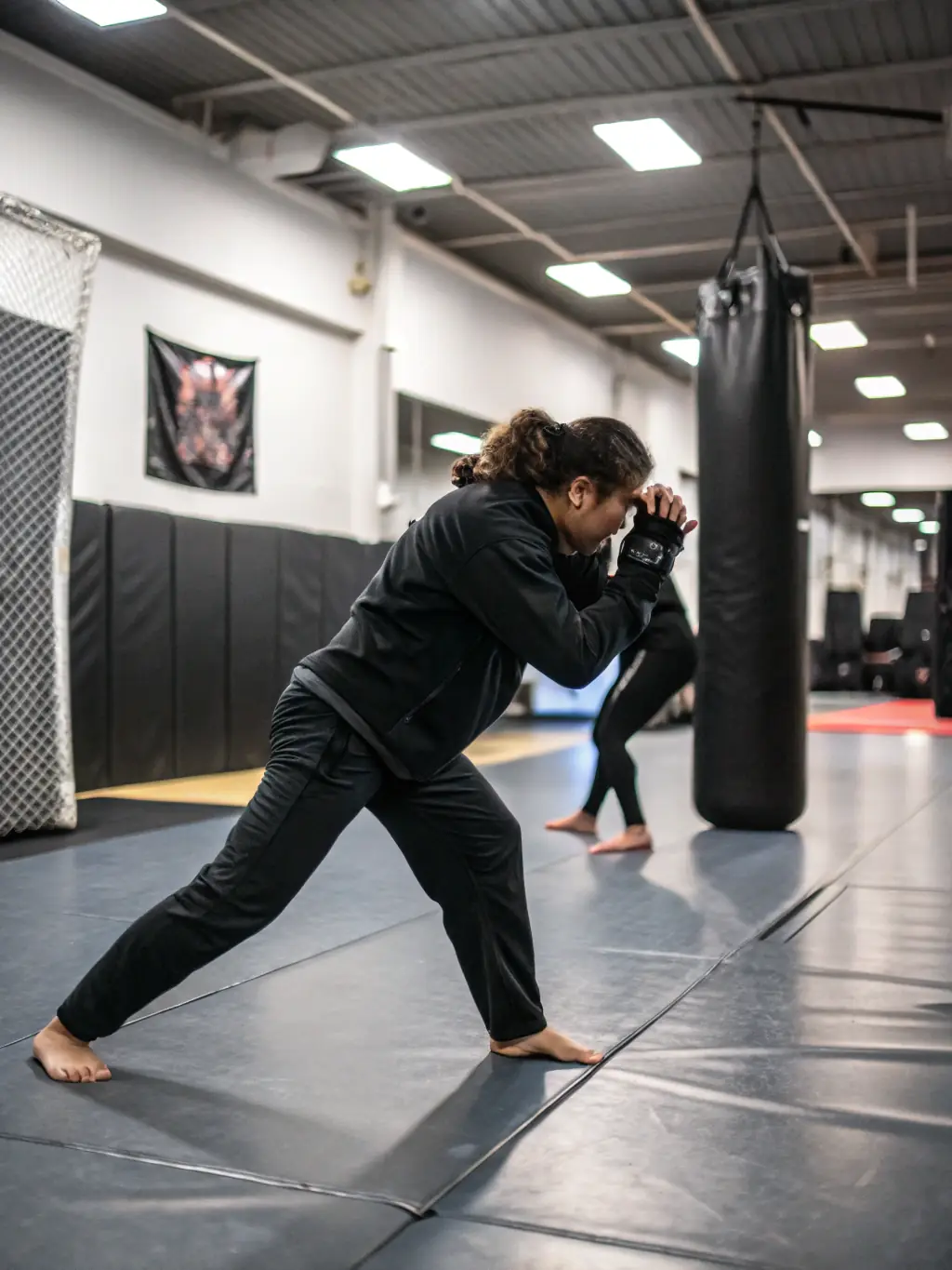 A student confidently executing a self-defense technique, illustrating the practical skills and self-assurance gained through SANFLORAINE D' AIKIDO's training programs.